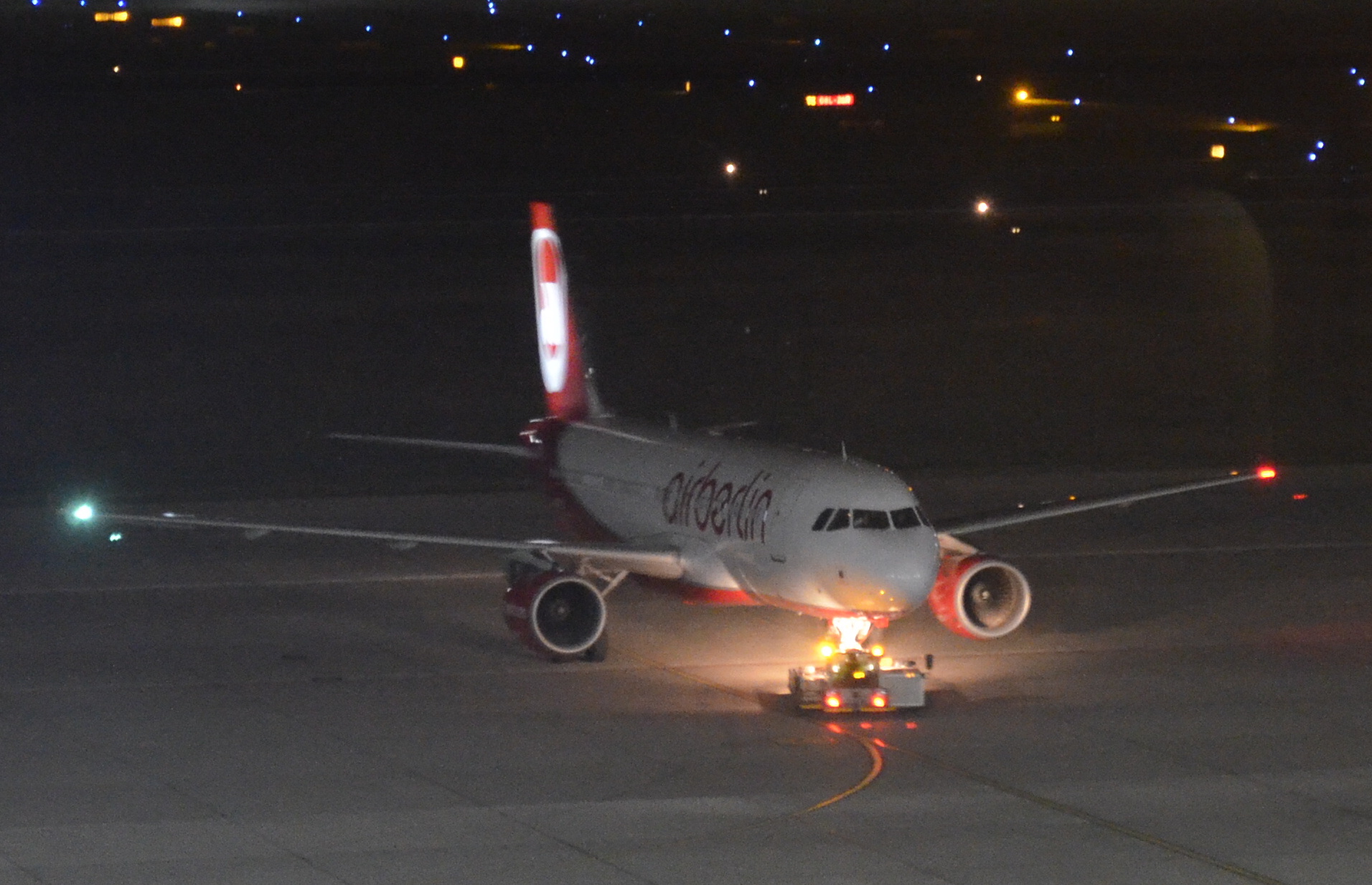 An Air Berlin Airbus A320 being pushed back at Berlin-Tegel Airport (EDDT)