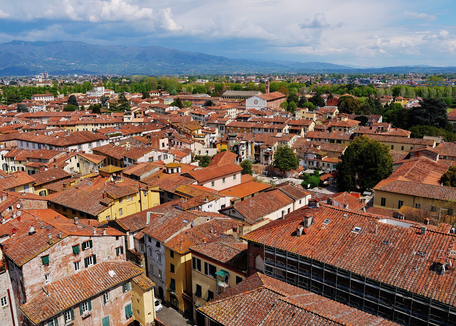 Panoramic view of Lucca from the Torre Guinigi, showing the medieval city's rooftops and towers