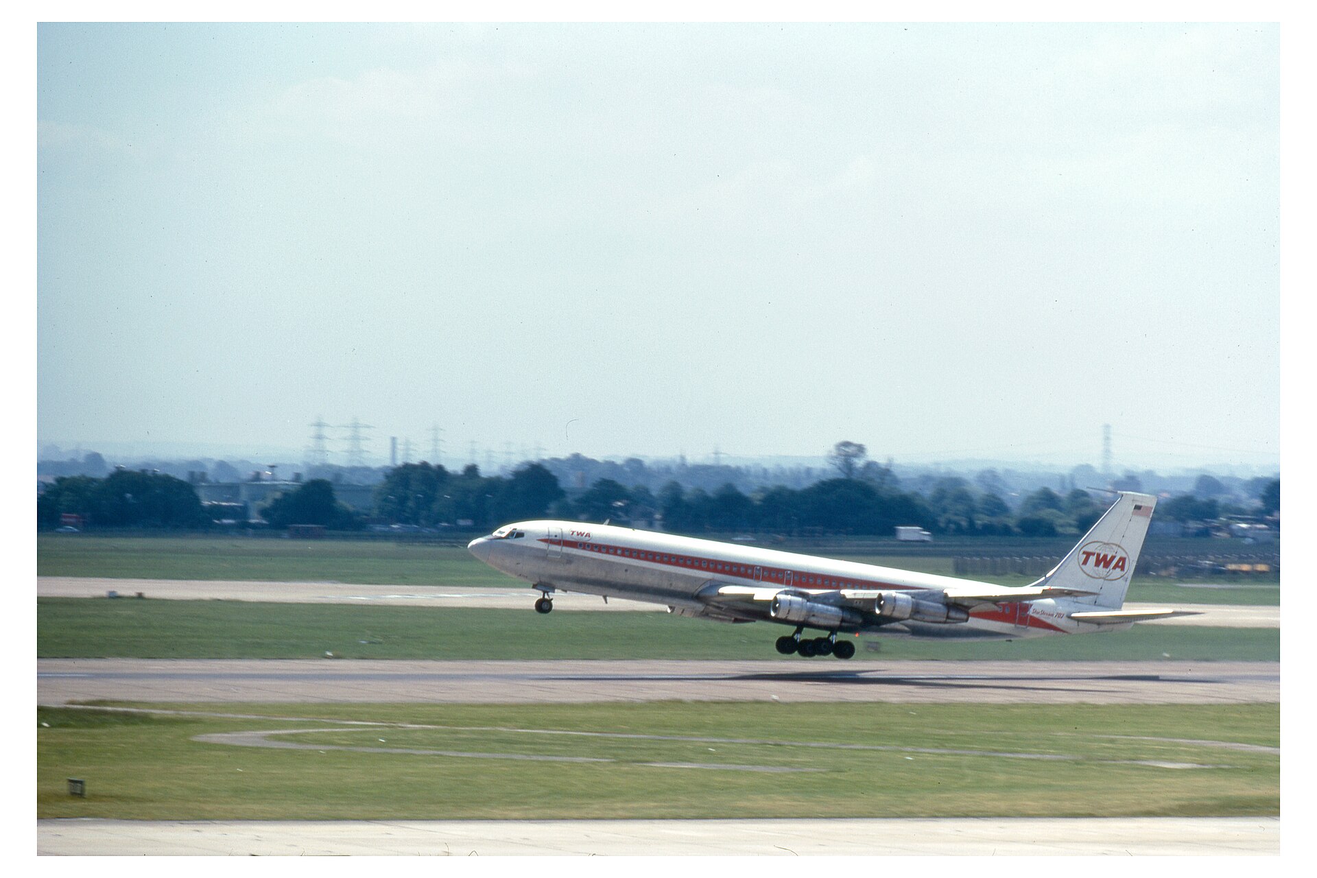TWA Boeing 707 jet airliner in flight
