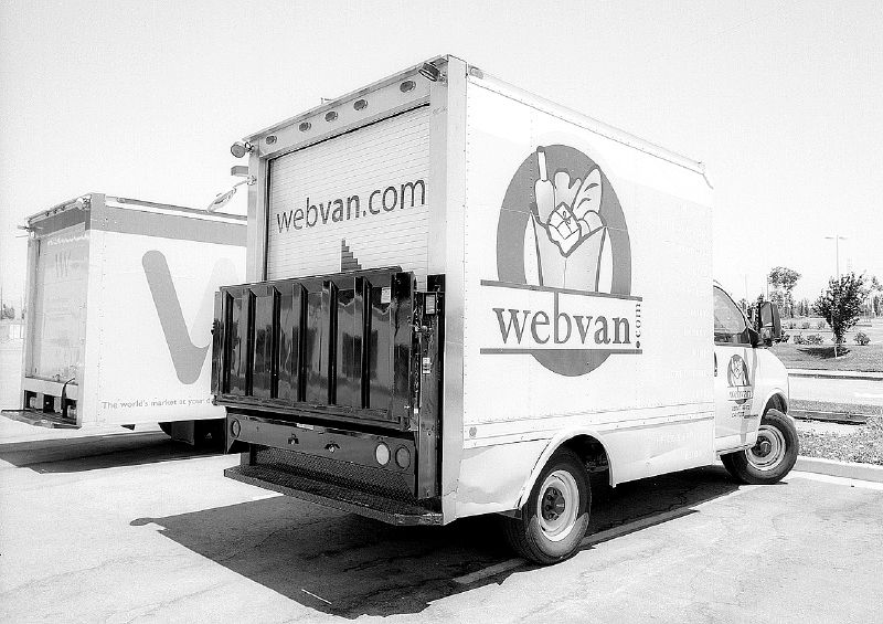 A Webvan grocery delivery truck photographed in 2005, in the defunct company's livery.