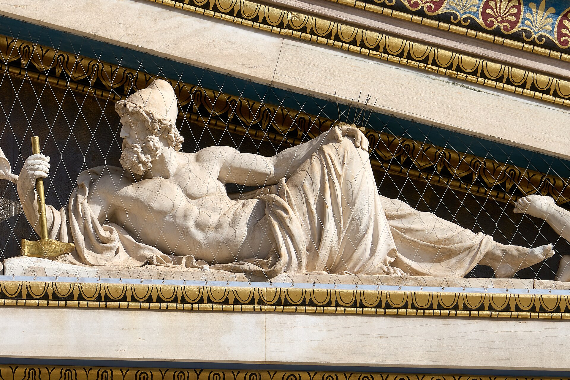 Statue of Hephaestus by Leonidas Drosis on the pediment of the Academy of Athens