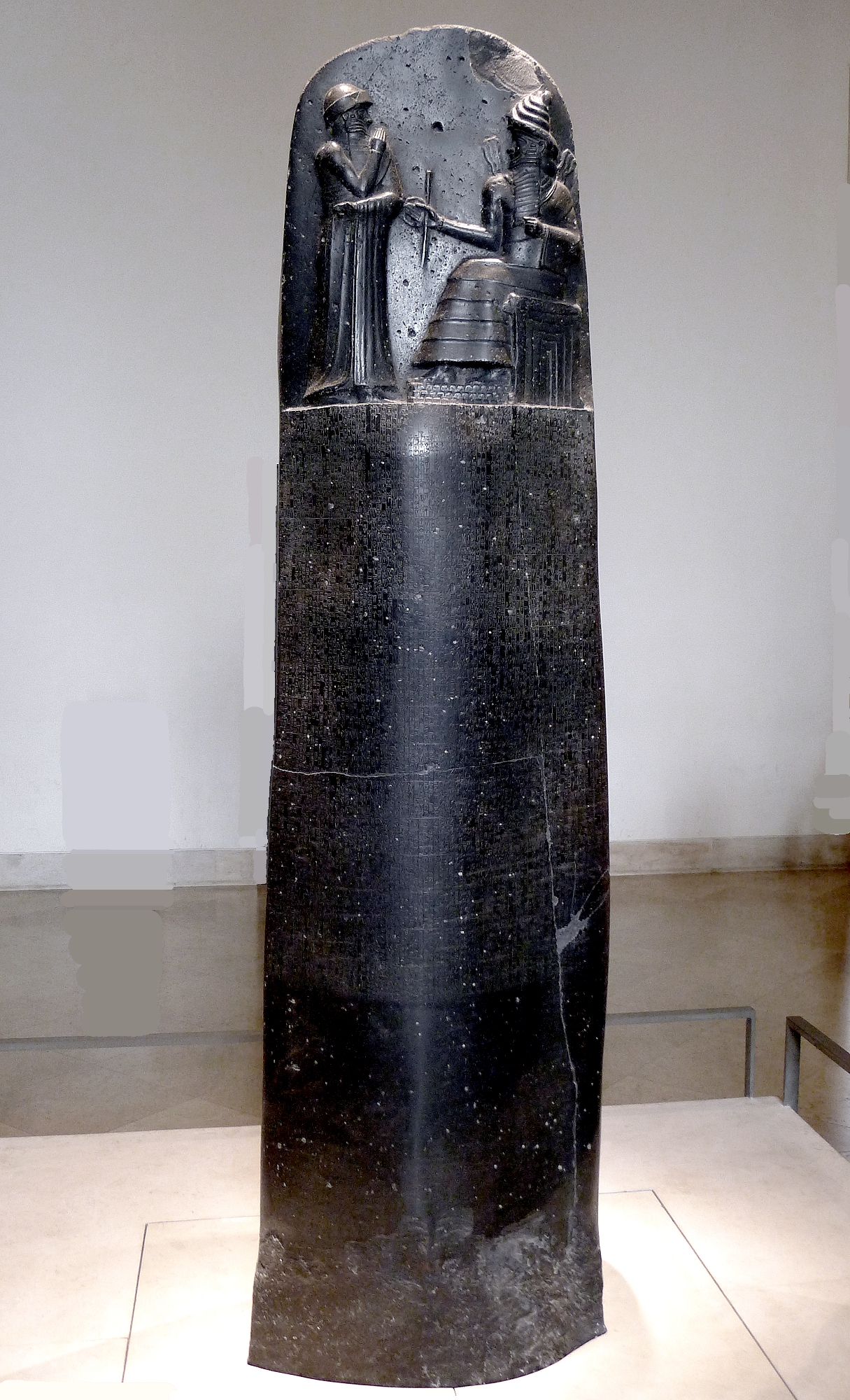 Upper relief of the Code of Hammurabi stele showing the sun god Shamash giving the laws to King Hammurabi, Louvre