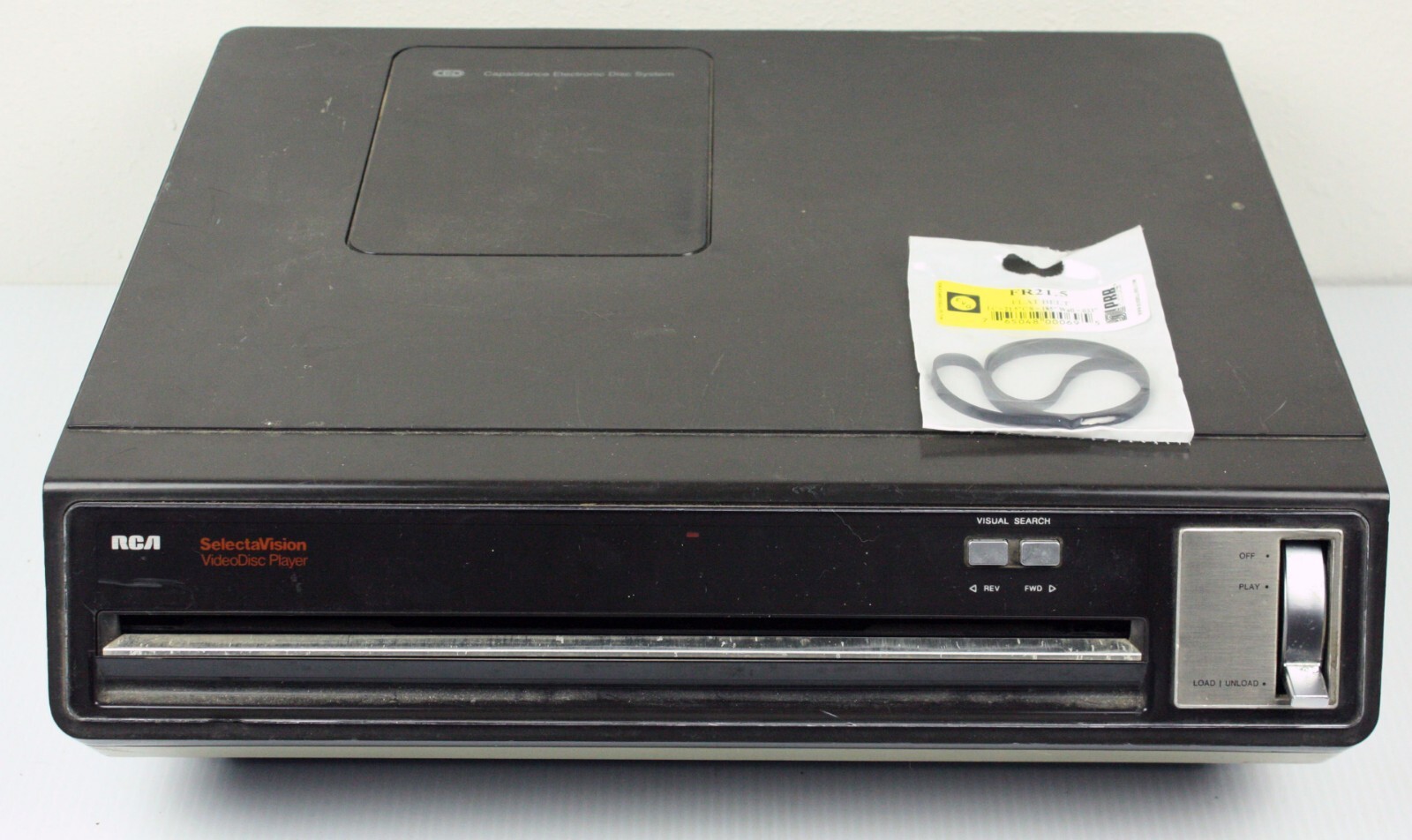 An RCA SelectaVision CED VideoDisc in its protective plastic caddy.