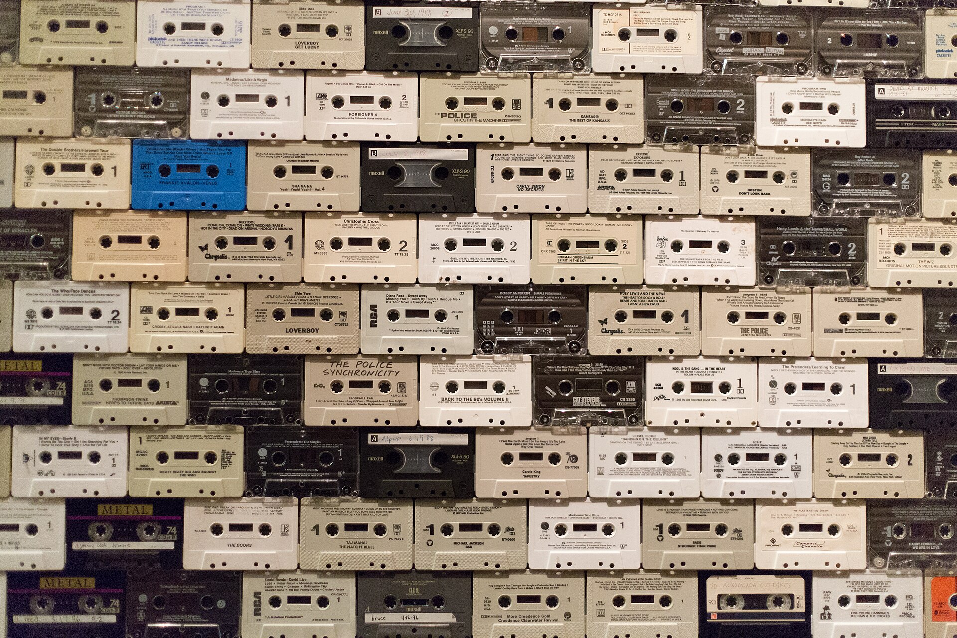 A wall of stacked compact cassette tapes