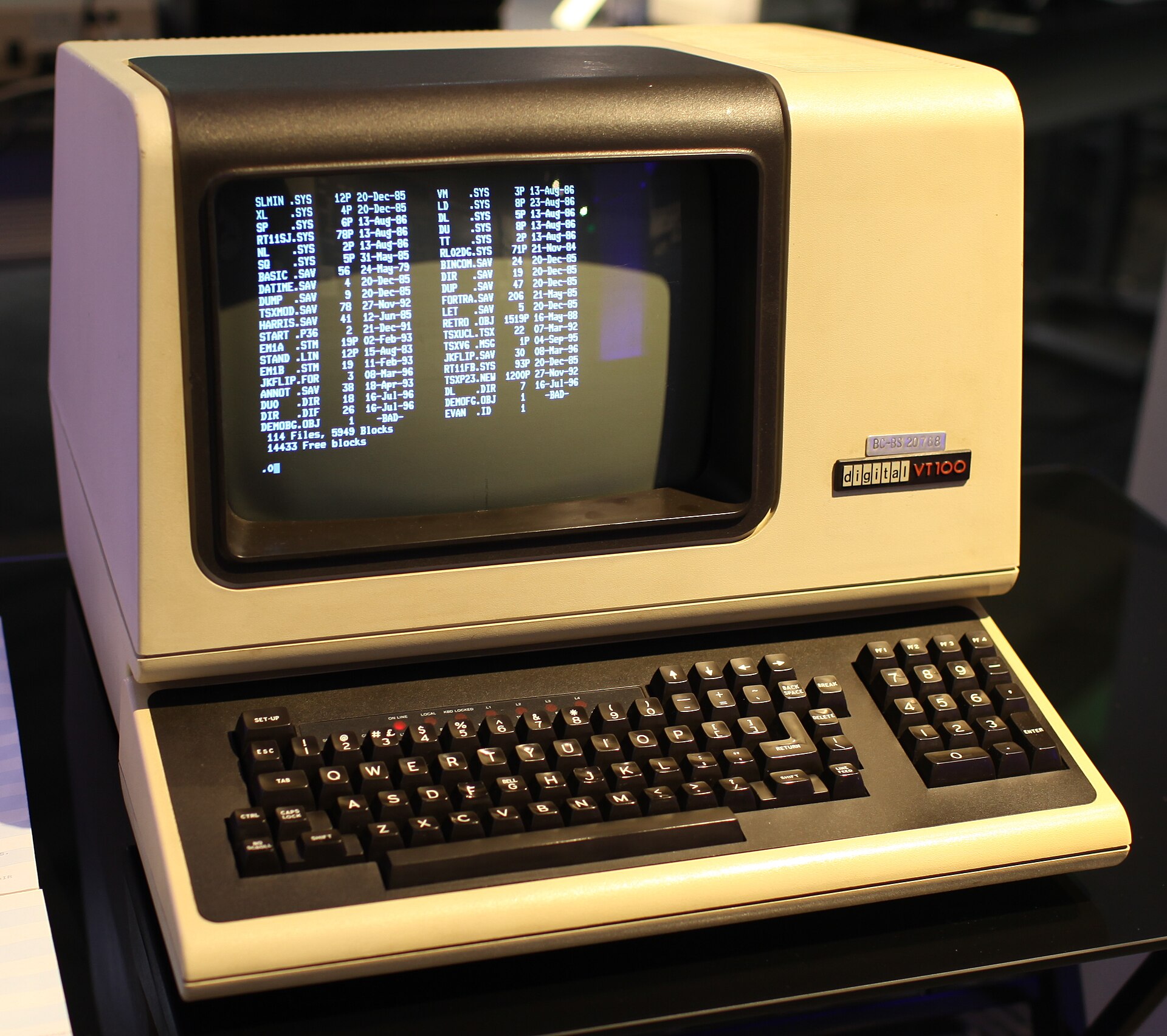A DEC VT100 video display terminal with its cream case, keyboard and CRT.