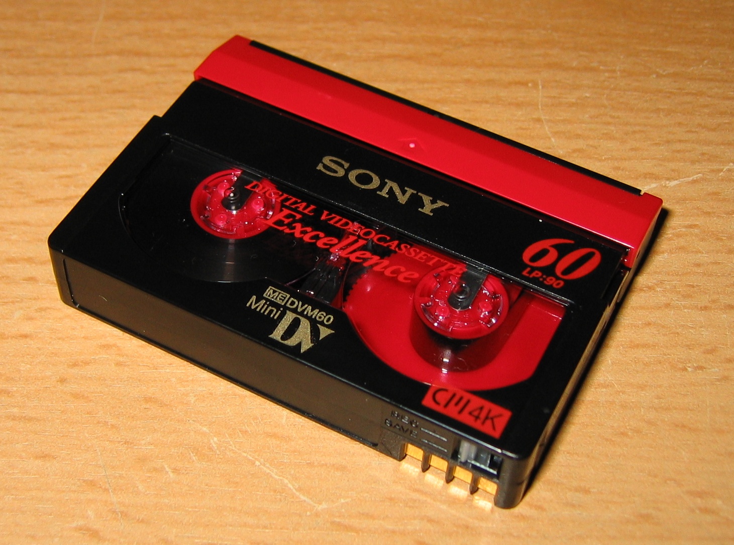 A MiniDV cassette, the small digital video tape of the late 1990s and 2000s.