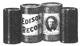 Wax phonograph cylinder records in their cardboard packaging tubes