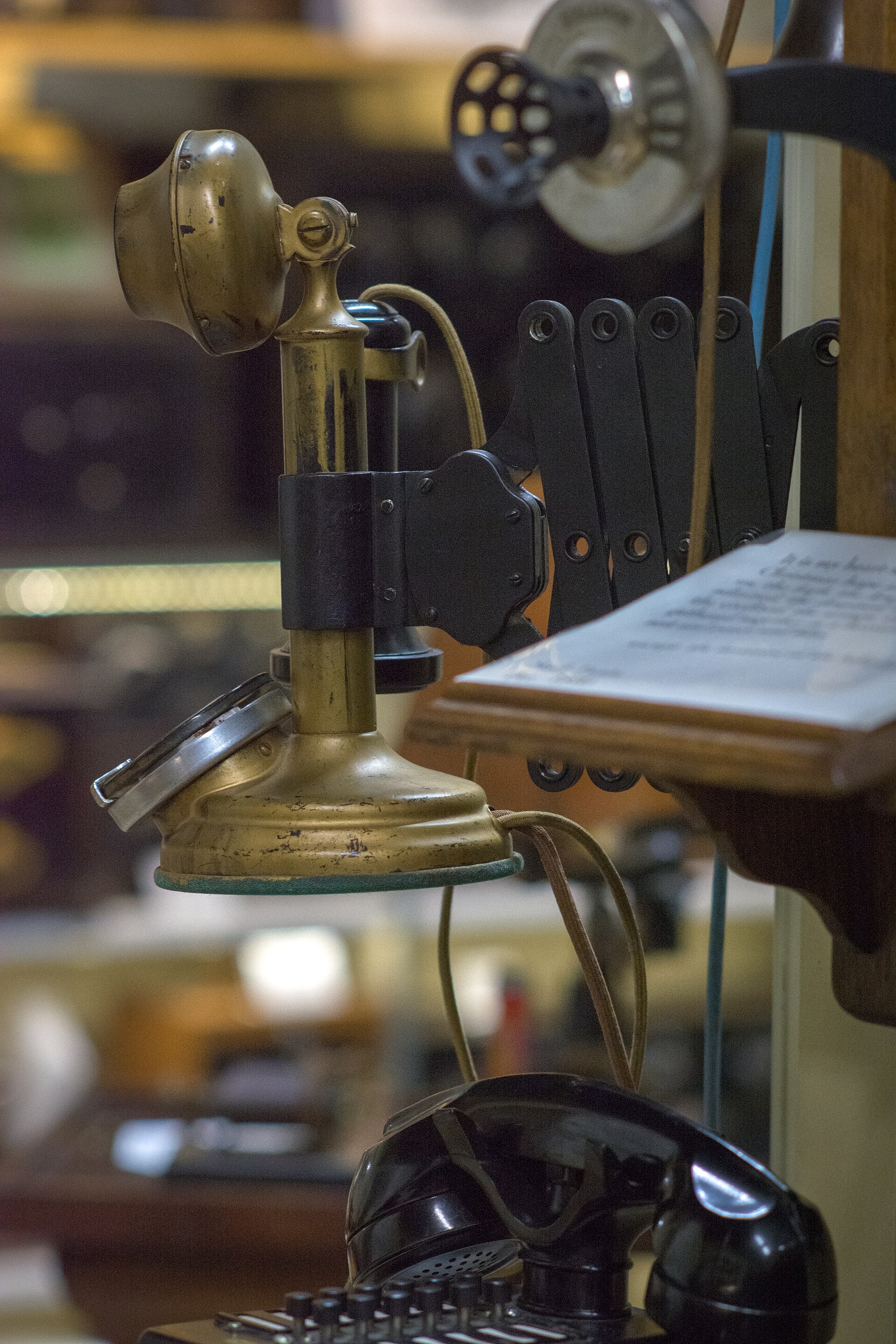 Candlestick telephone with rotary base on display at the Vintage Radio & Communications Museum of Connecticut