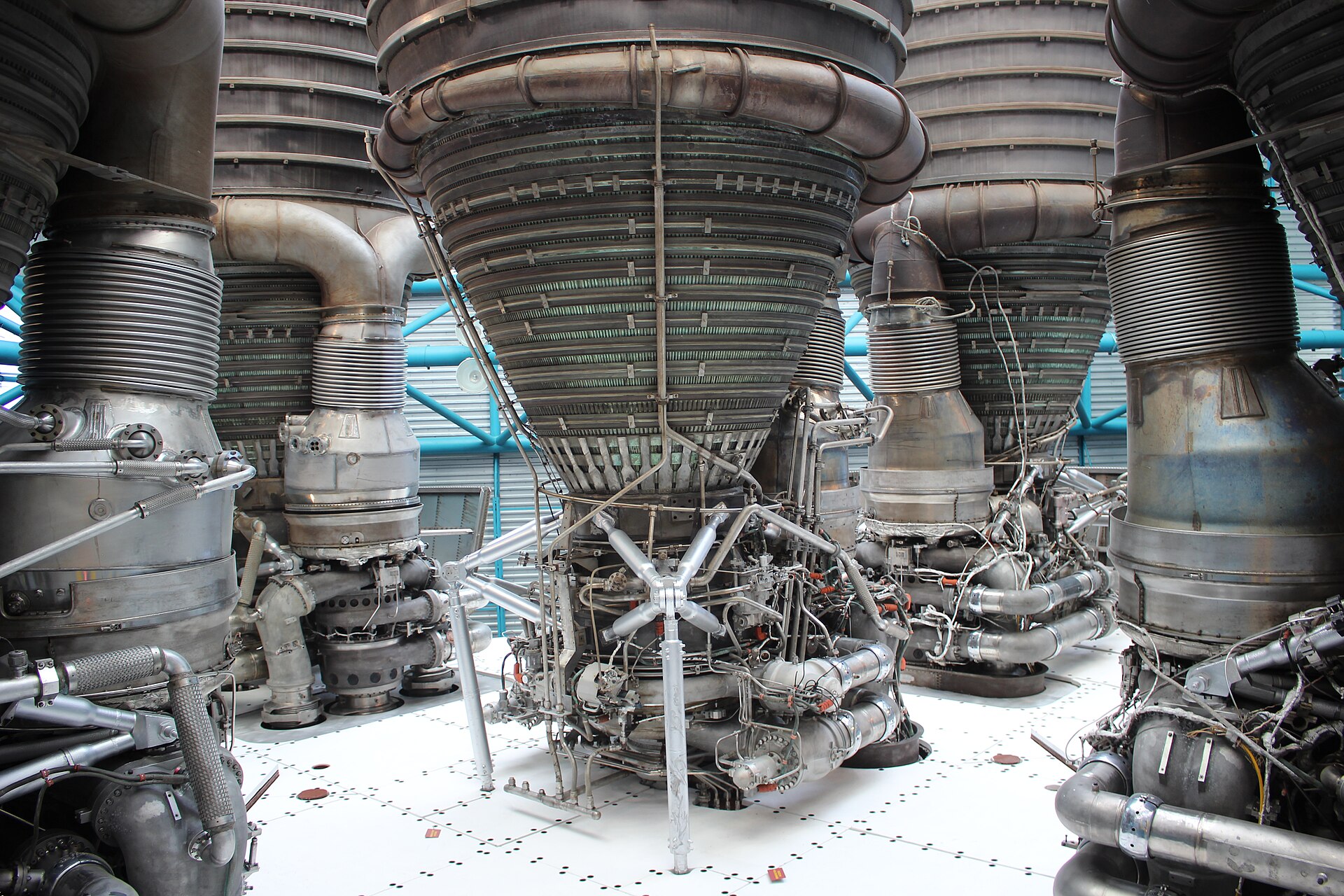 Looking upward at the cluster of five F-1 first-stage engines at the base of a Saturn V