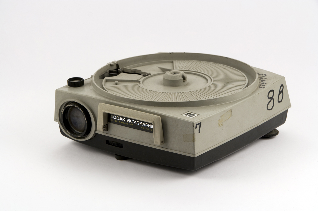 A Kodak carousel 35mm slide projector with a horizontal circular slide tray, Museo della Scienza e della Tecnologia, Milan.