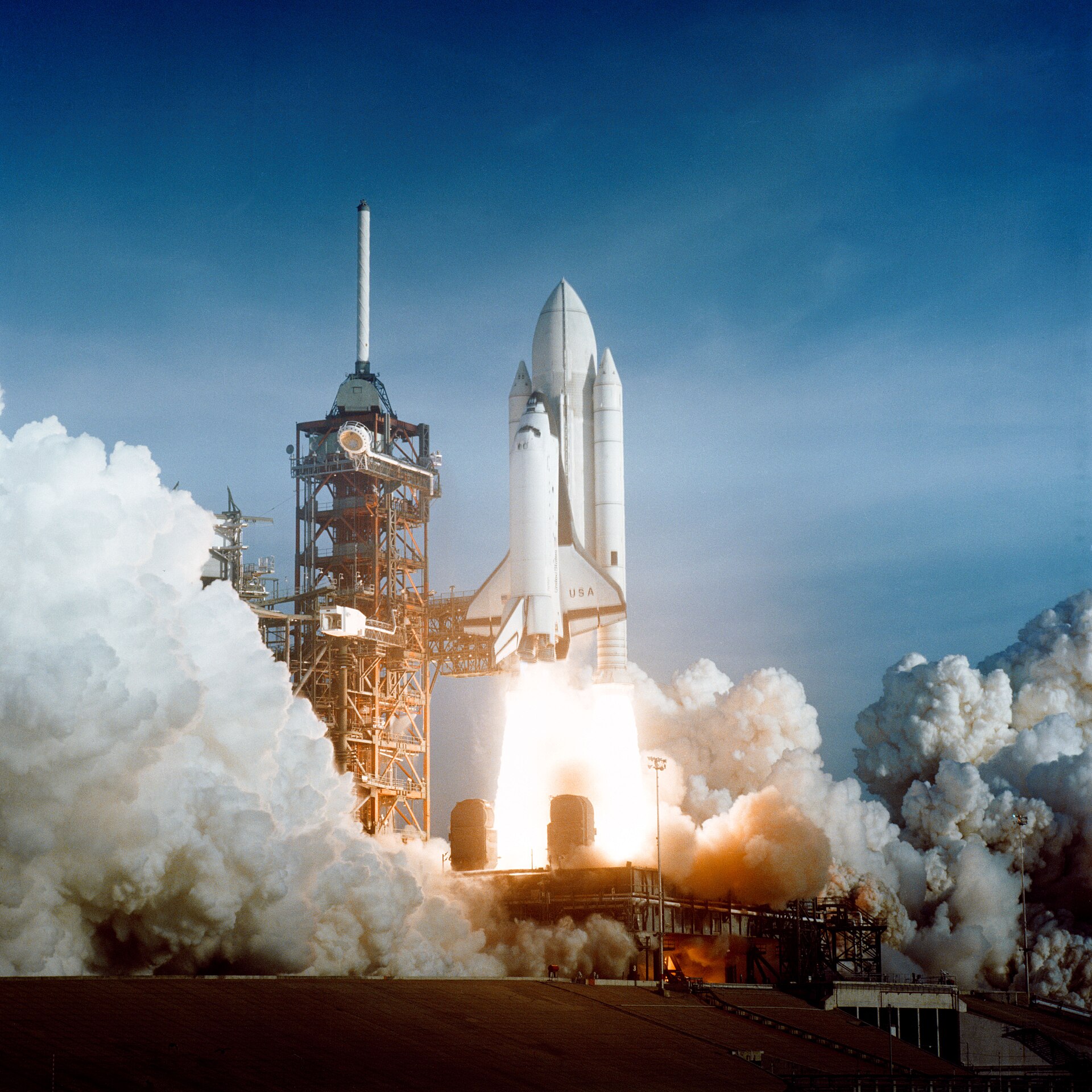 Space Shuttle Columbia lifting off from Kennedy Space Center on April 12, 1981, the first Shuttle launch (STS-1).