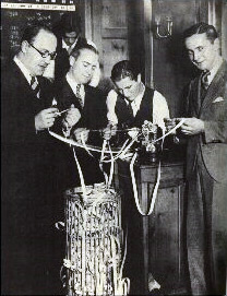 Mechanical stock ticker under a glass dome