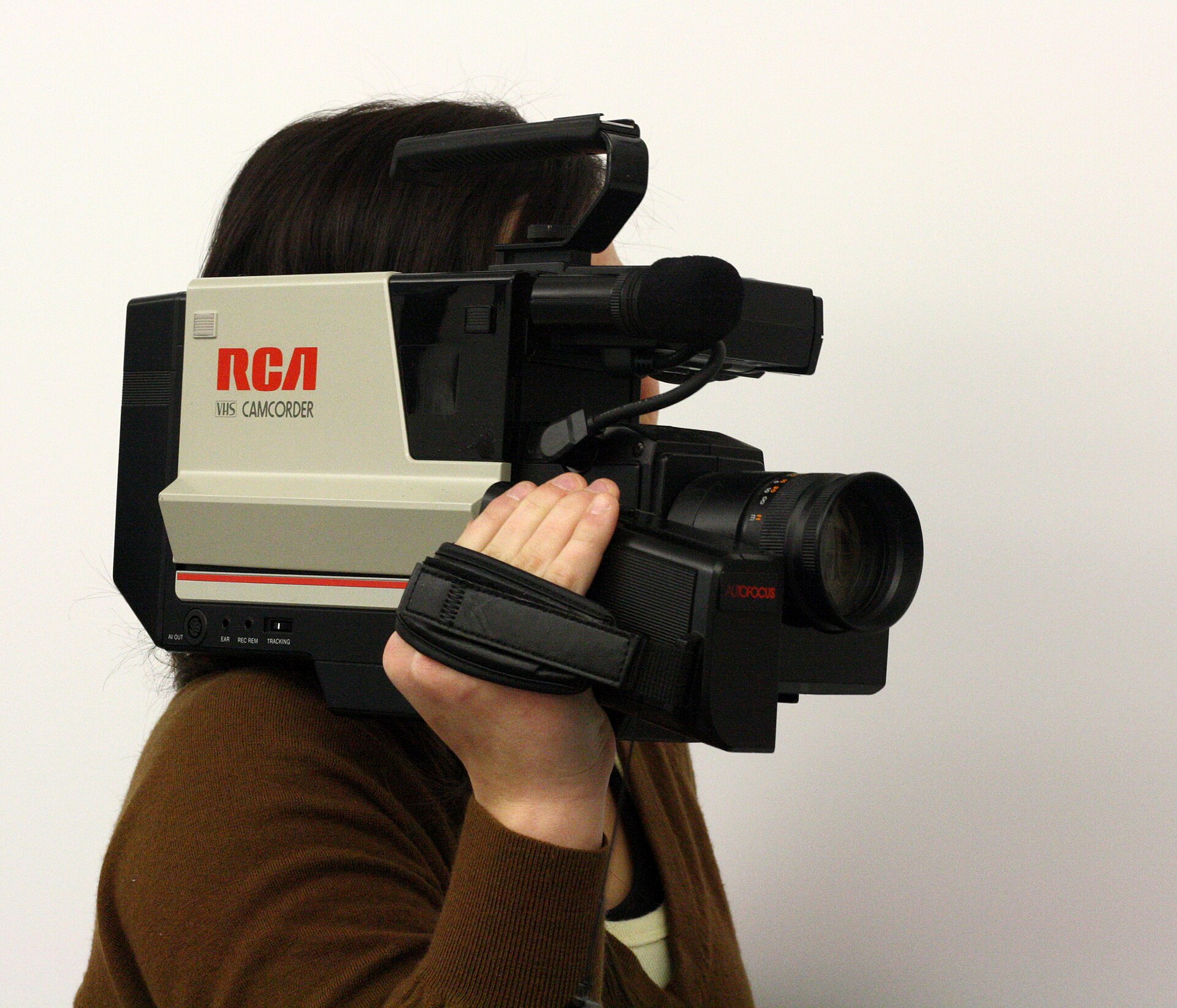 A full-size RCA shoulder-mount VHS camcorder of the kind used for home video in the 1980s.